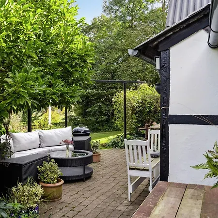 Timber-framed With Bright And Idyllic Garden